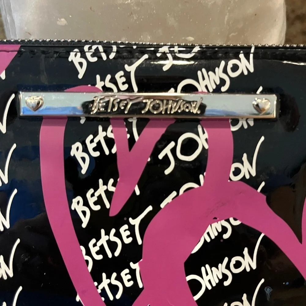 Betsey Johnson Black and Pink Wristlet with Heart Design